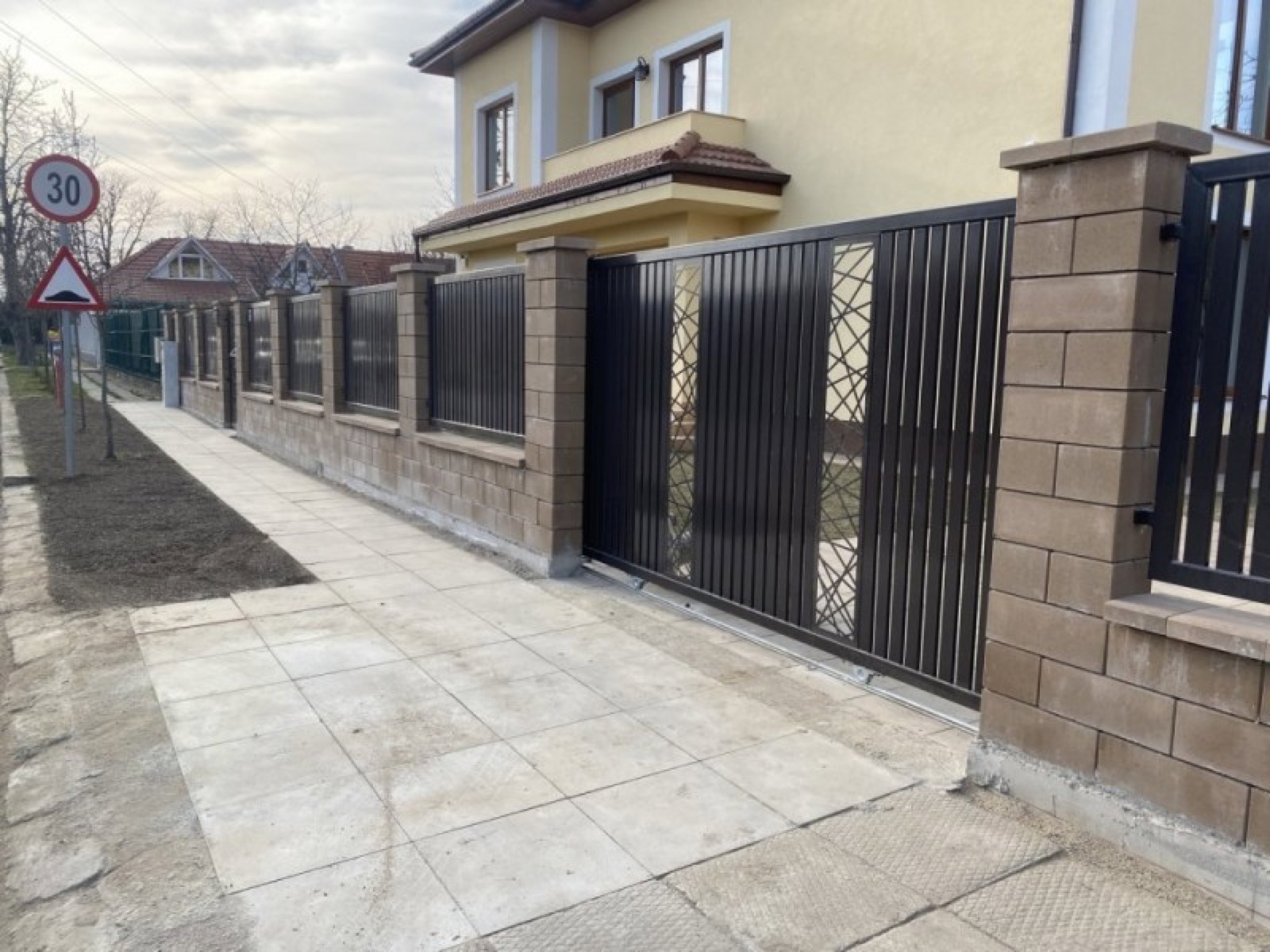 Swing gate with central perforated pattern